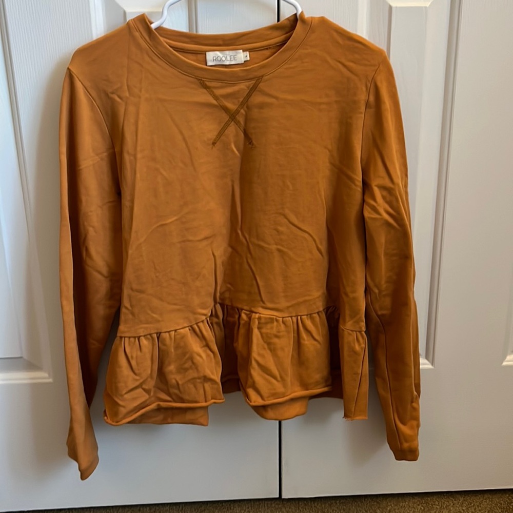 Roolee long sleeve peplum top, never worn, size L